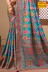 Aqua blue printed satin silk wedding wear saree