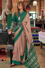 Peach Silk Saree with Green Border– Vintage Patola Printed Designer Saree