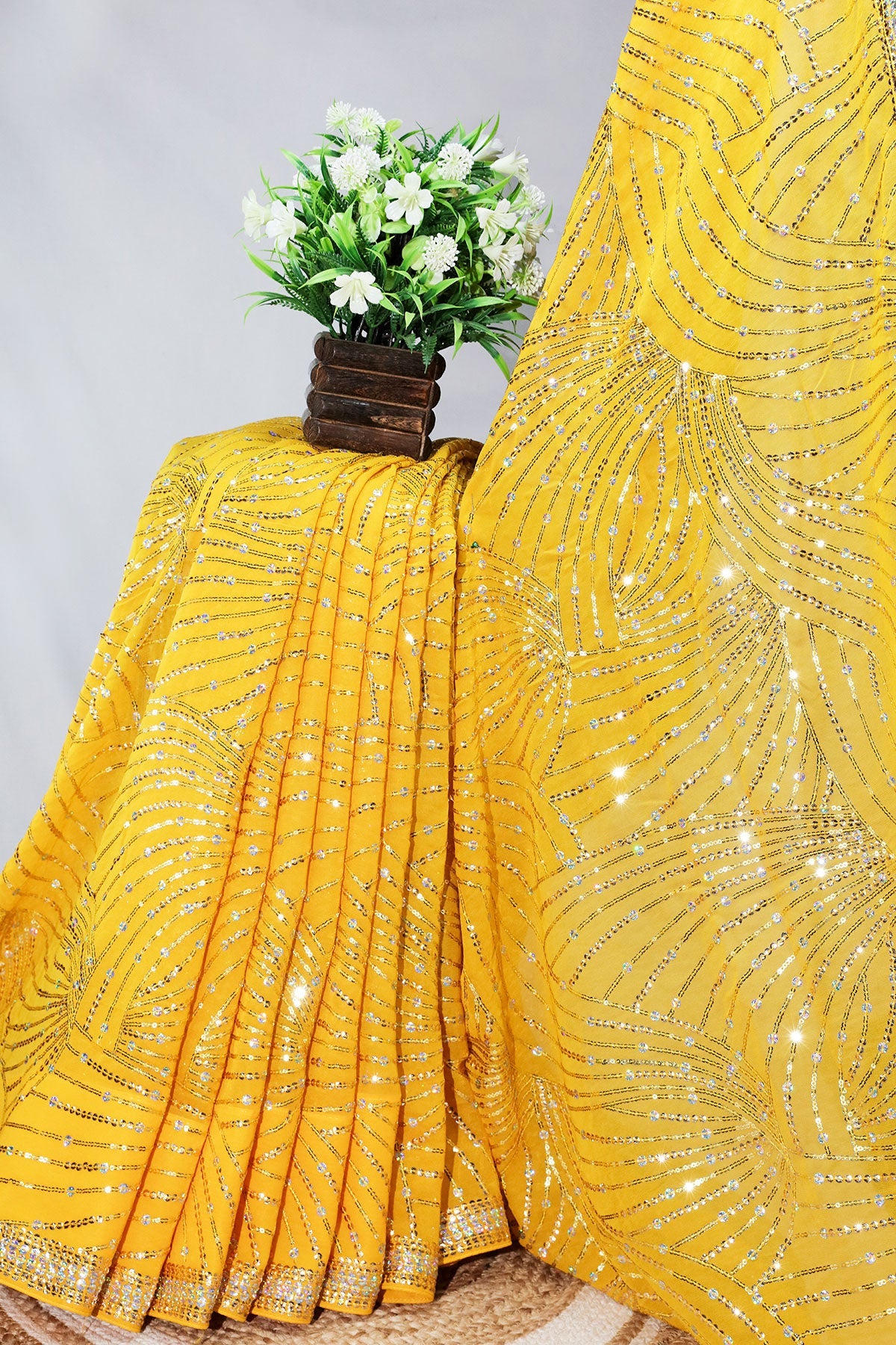 Yellow Georgette Sequins Embroidered Saree with Tassels Embellishments