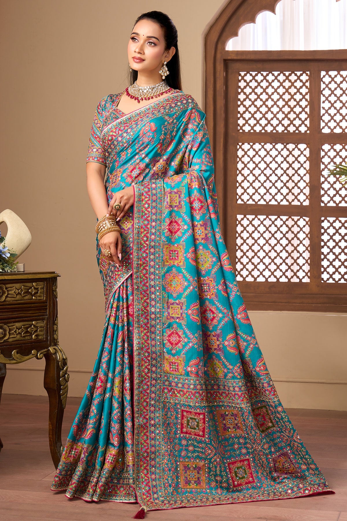 Aqua blue printed satin silk wedding wear saree