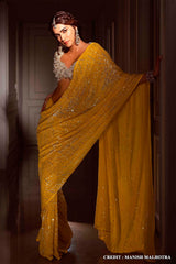 Yellow Georgette Sequins Embroidered Saree with Tassels Embellishments