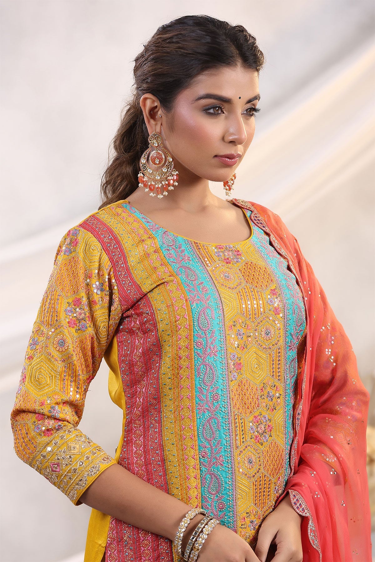 Mustard Silk Floral and Paisley Motif Threadwork and Sequins Embroidered Unstitched Suit