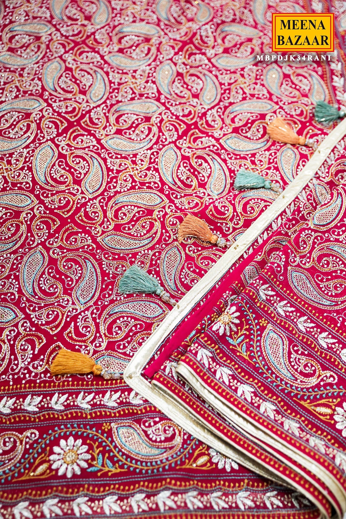 Graceful Rani Pink Georgette Saree with Embroidered Detailing