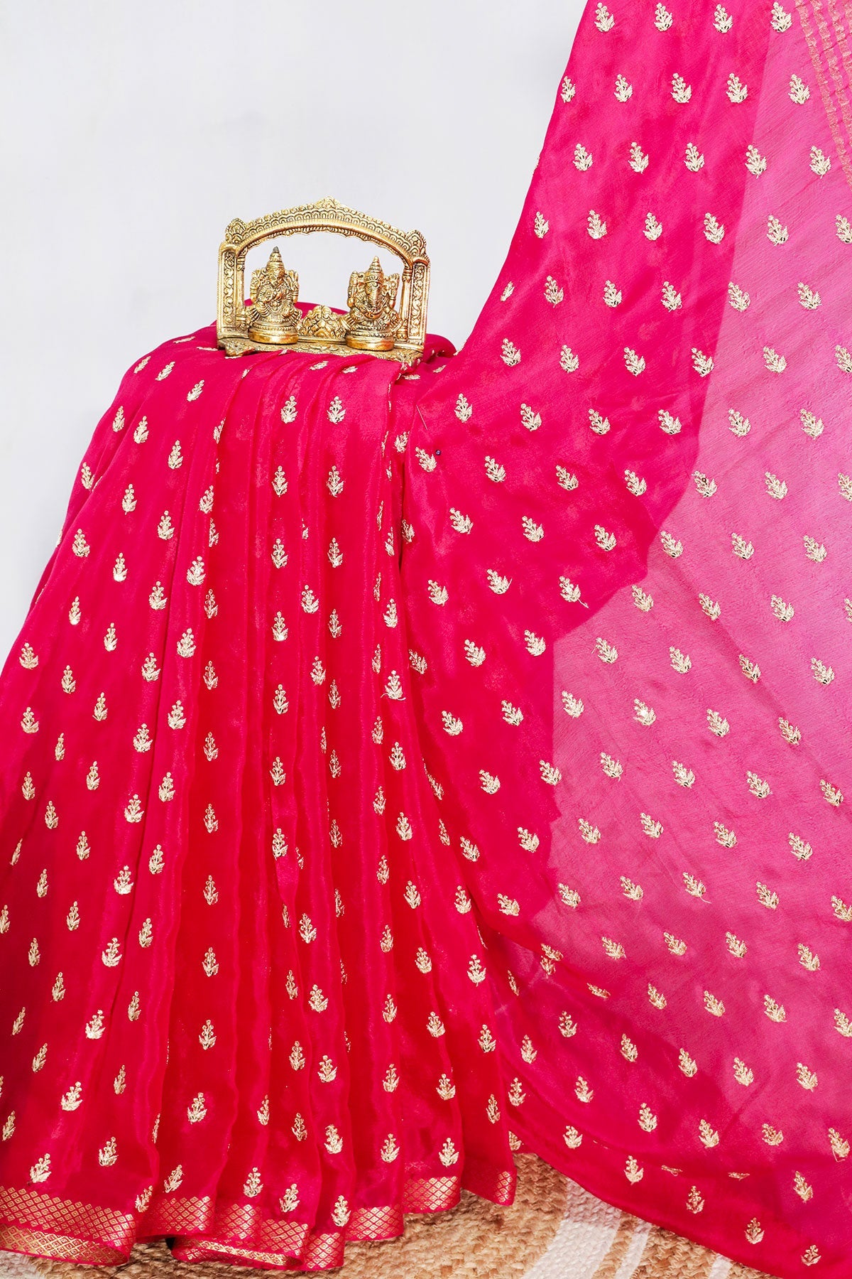 Rani Pink Chiffon Saree with Delicate Border and Elegant Drape